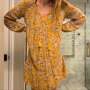 flowy yellow dress with flowers